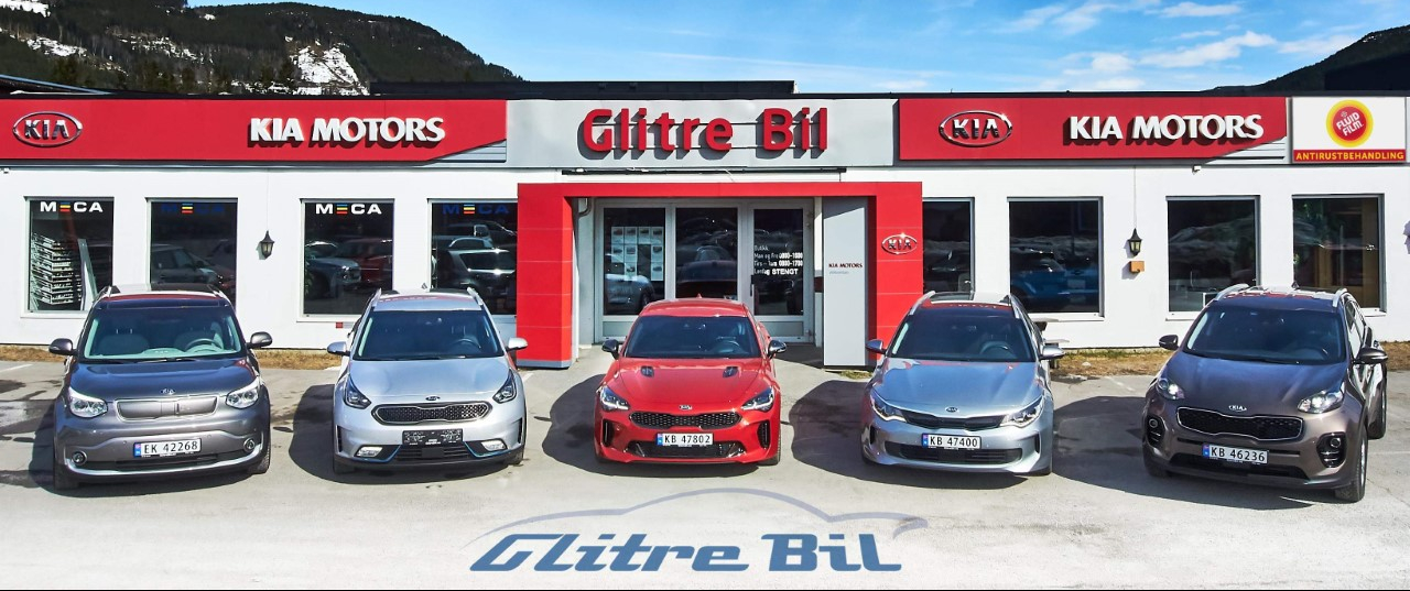 Glitre Bil på Gol med fem Kia-biler foran butikken